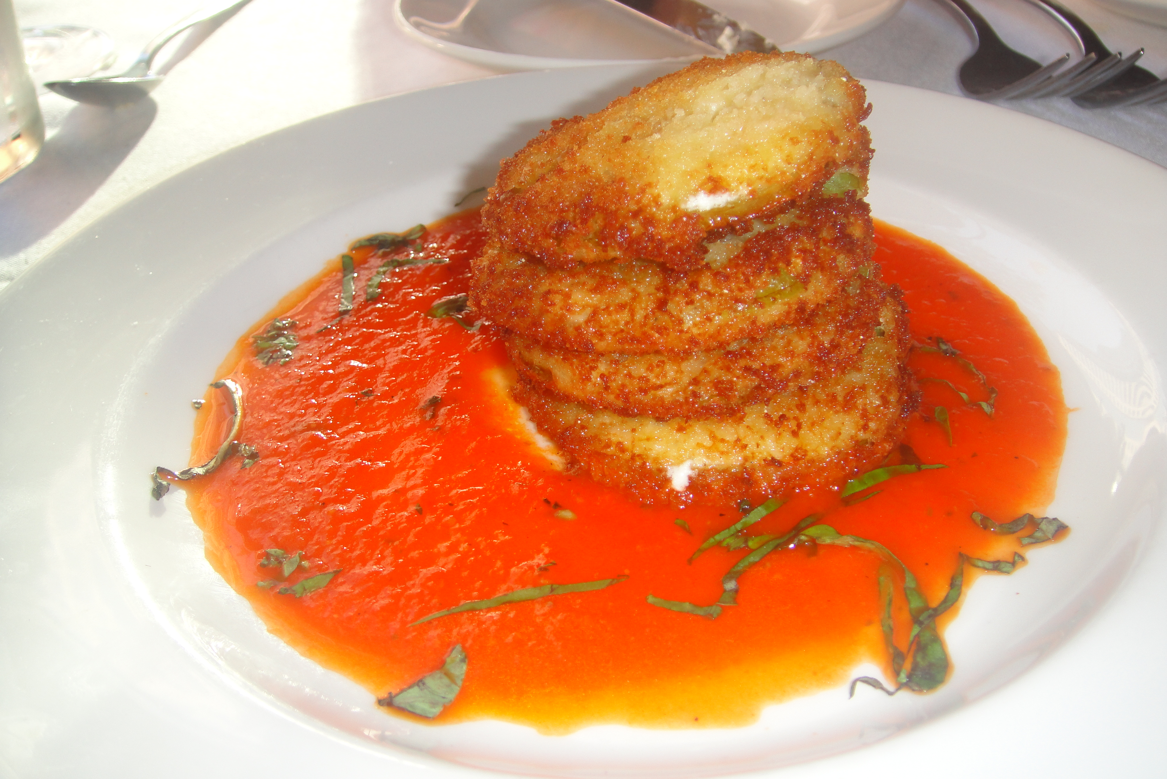 Fried Green Tomatoes With Goat Cheese And Red Pepper Coulis From